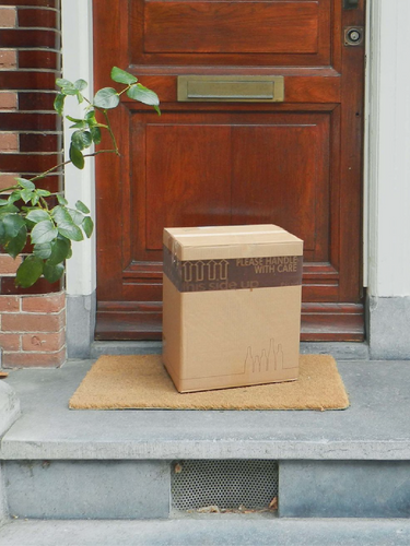 Vinologix package that has been delivered to a customer's doorstep